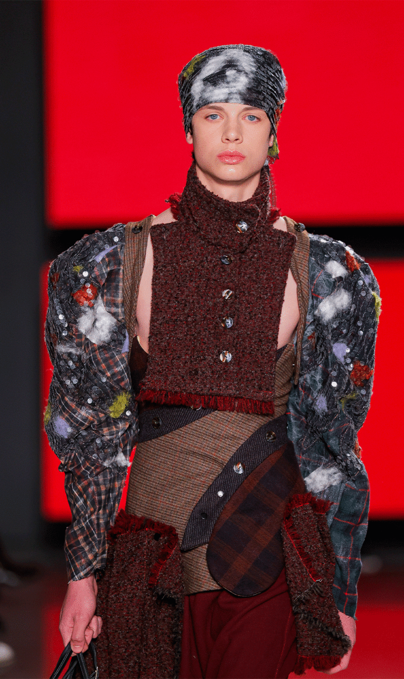 Male model walking the runway wearing the "Devolata ao mar" collection by IED Barcelona graduate designer Gabriel Silva Barros at Sangue Novo - ModaLisboa