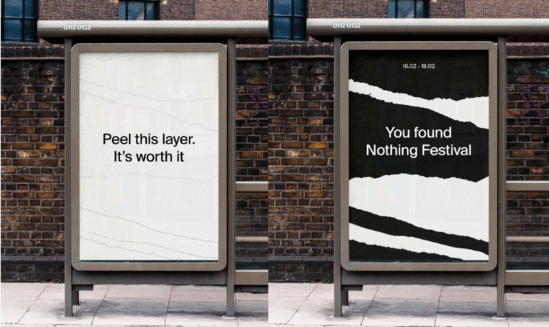 Two street canopies with one white sign and another black and white sign with two lines of text in the middle