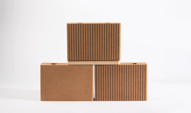 Three interlocking cork panels on a white background
