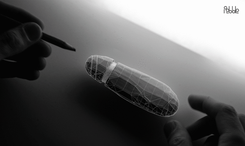 Black and white image of a handheld device with angles marked in white lines