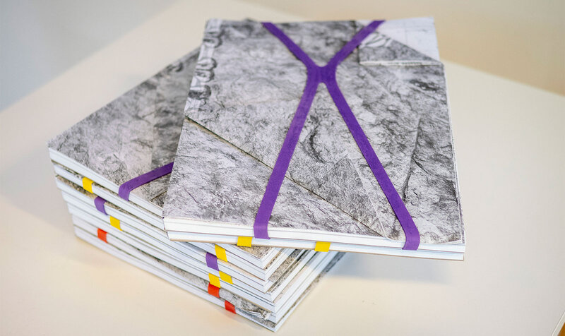 Close-up of several books at an art and design exhibition