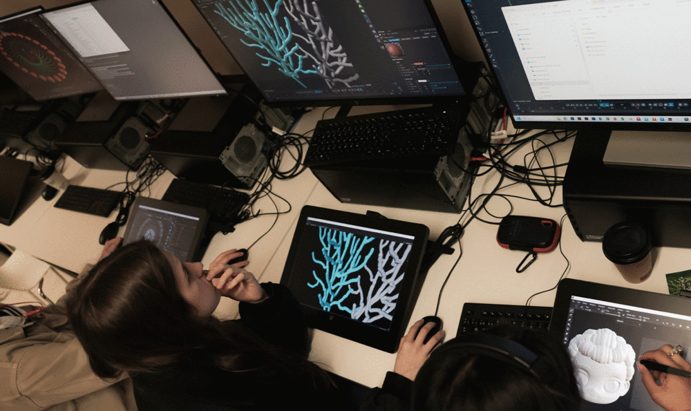 Three students from IED Barcelona designing with XPPEN digital tablets