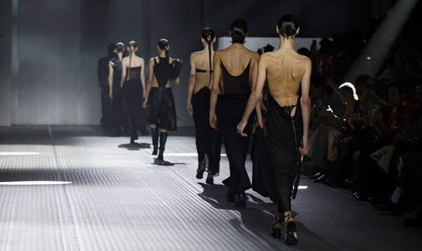 Professional fashion catwalk with models parading